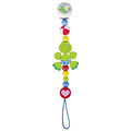Colorful baby teether with a frog design on a white background