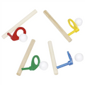 Colorful croquet set with mallets and balls on a white background