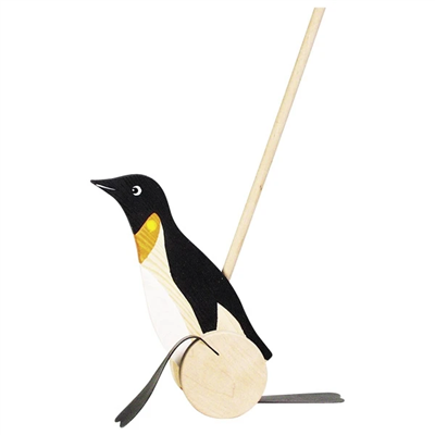 Wooden penguin toy on a white background