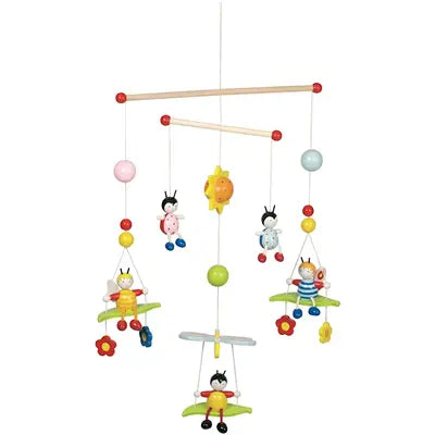 Colorful children's mobile with hanging toys on a white background