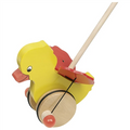 Yellow duck-shaped pull toy with a red beak on a white background