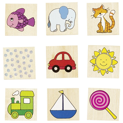 Set of wooden stamps with various animal and object designs on a white background