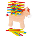 Wooden piggy bank with colorful sticks on a white background