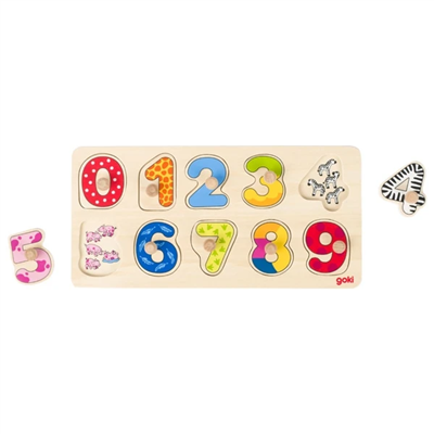 Wooden puzzle with colorful numbers and animal shapes on a white background