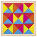 Colorful geometric triangle puzzle on a wooden board