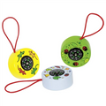 Three colorful compasses with red strings on a white background