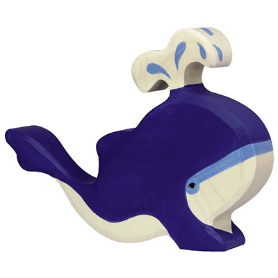 Wooden toy whale with blue body and white top on a white background