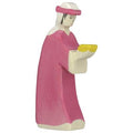 Figurine of a character in a pink dress with a white headband on a white background