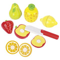 Set of toy fruits and a toy knife on a white background