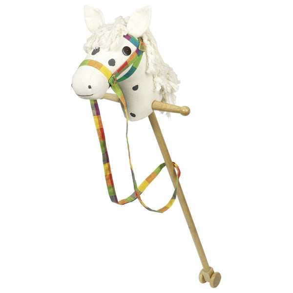White rocking horse with a colorful mane on a white background