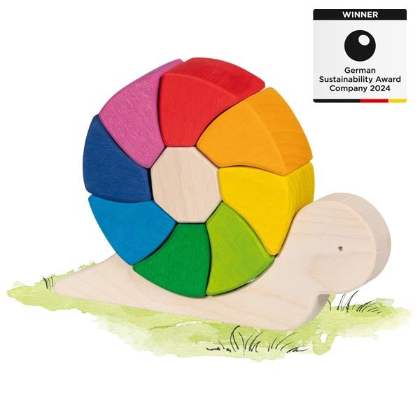Colorful wooden snail toy with a color wheel on a white background, featuring the German Sustainability Award 2024 badge.