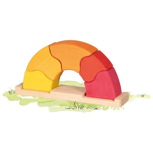 Colorful wooden arch toy on a white background