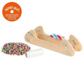 Wooden toy with colorful beads and a 'spiel gut!' logo on a white background