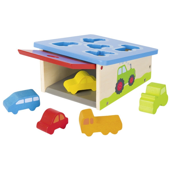 Colorful wooden shape sorter toy with car-shaped blocks on a white background