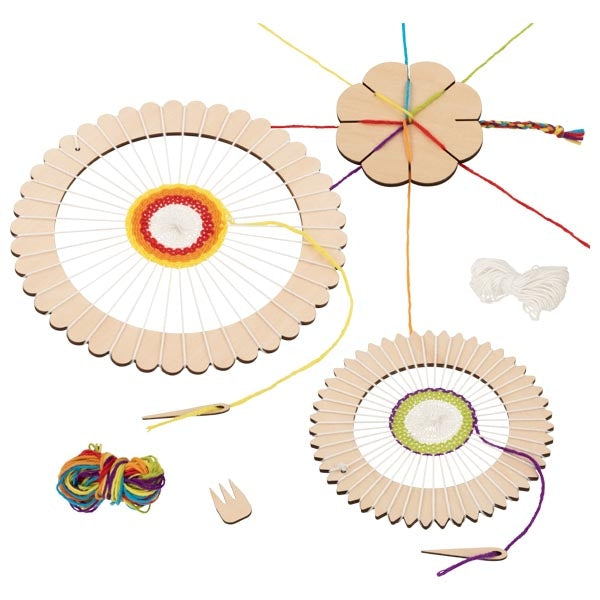 Wooden loom kit with colorful yarn on a white background