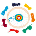 Colorful lacing wheel with various colored strings on a white background