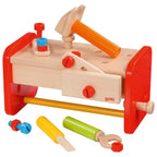 Toy workbench with tools on a white background