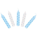 Five birthday candles with blue and white polka dots on a white background