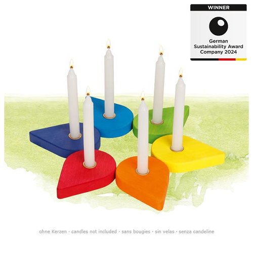 Colorful candle holder with candles on a white background, featuring a German Sustainability Award badge.