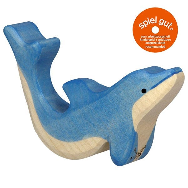 Wooden toy dolphin with 'spiel gut' certification logo on a white background