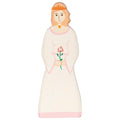 Wooden doll with a dress featuring a rose design on a white background