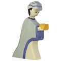 Wooden figurine of a person in traditional attire holding a yellow object on a white background