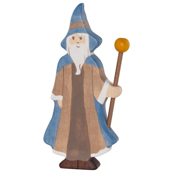 Wooden figurine of a wizard with a blue hood and brown robe on a white background