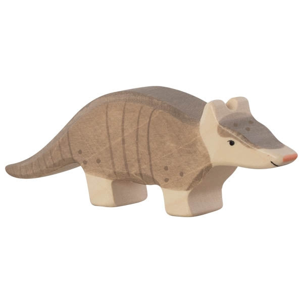 Wooden armadillo toy on a white background