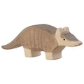 Wooden armadillo toy on a white background