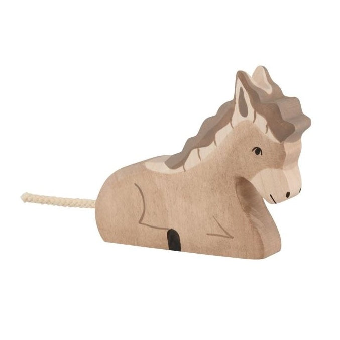 Wooden donkey toy on a white background