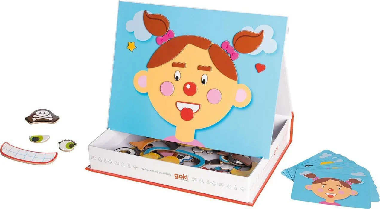 Magnetic game, funny faces girl